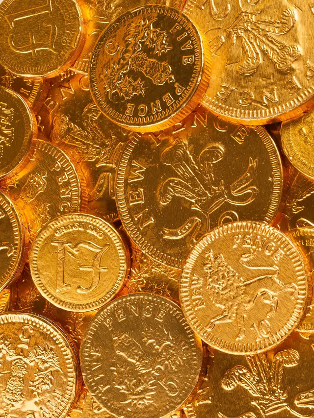 A close-up of gold coins