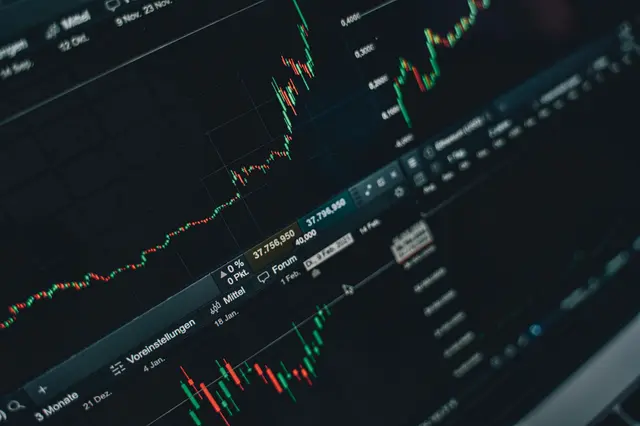 A rising stock market chart on a trading screen
